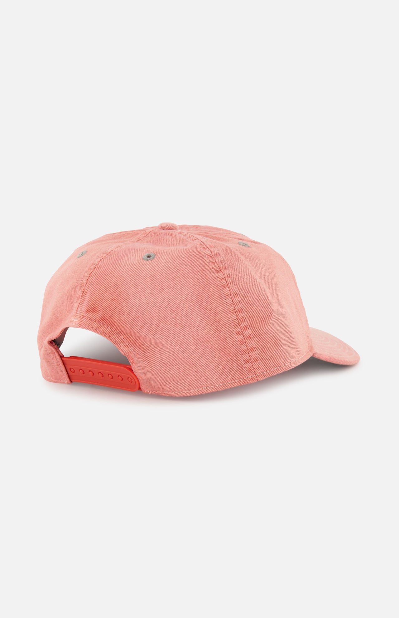 The RALPH LAUREN RRL Cotton Twill Faded Ball Hat in coral pink features a soft cotton twill fabric, adjustable snapback closure, and ventilation eyelets. Its vintage look stands out against a plain white background.