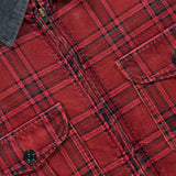 Close-up of the RALPH LAUREN RRL Cotton Zipped Corduroy Collared Overshirt in a red plaid pattern, featuring black buttons, two chest pockets, and a dark gray corduroy collar. This overshirt combines classic checkered styling with utility-inspired details for a versatile look.