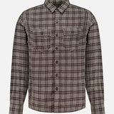 The Eaton Cotton Sport Shirt by RALPH LAUREN RRL is a long-sleeve, button-up cotton twill shirt featuring a brown and beige plaid pattern and two chest pockets, shown against a plain white background.