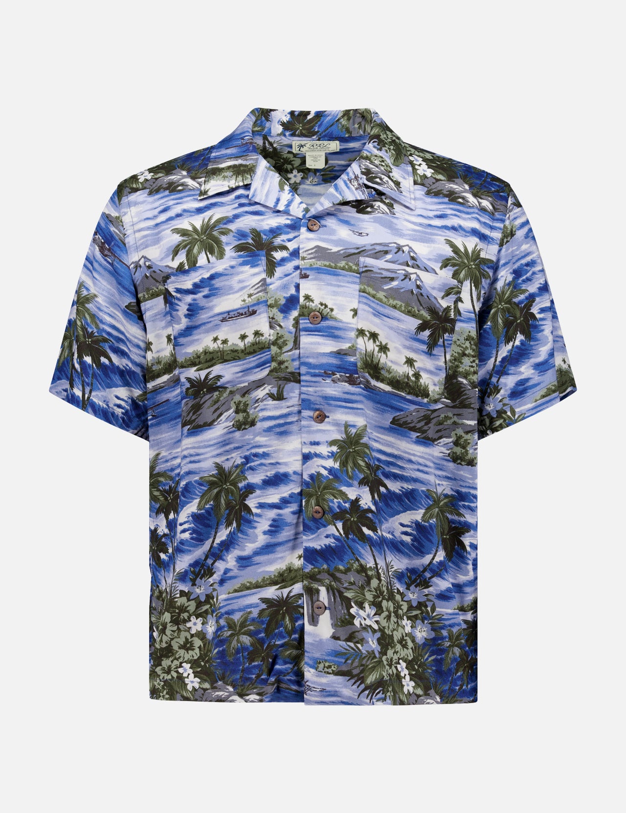 The RALPH LAUREN RRL Rayon 2-Pocket Camp Shirt is a short-sleeved, button-up blue shirt with tropical palm trees, waves, and green foliage motifs printed on lightweight woven fabric.