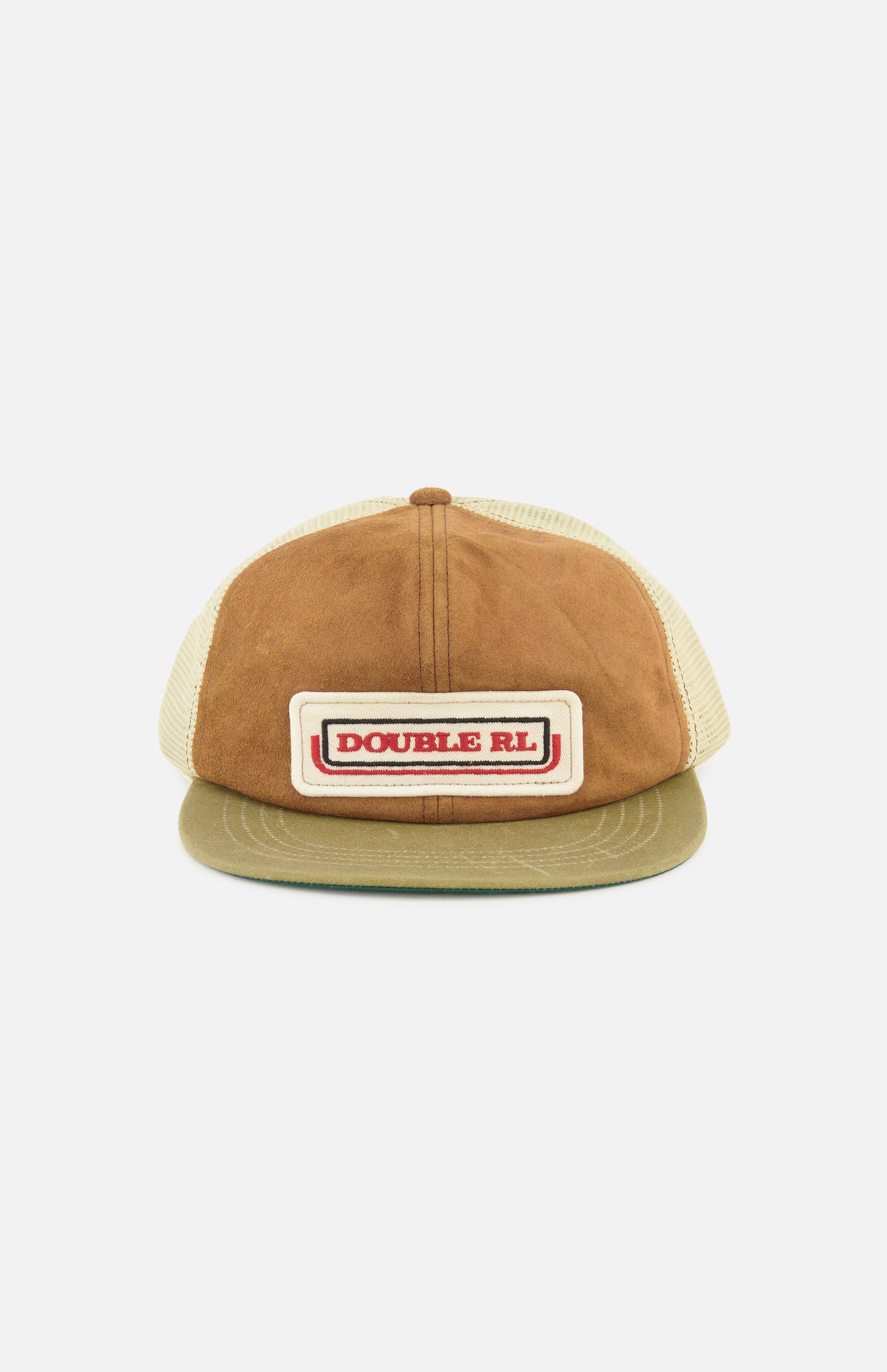 Front view of the Roughout Suede Trucker Cap by RALPH LAUREN RRL in tan and brown suede, featuring a beige mesh back. The front panel displays a rectangular patch with “DOUBLE RL” in red text against a white and brown background, while an adjustable back strap offers a comfortable fit.