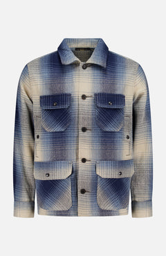 The RALPH LAUREN RRL Ruddic Wool Blend Sport Shirt, shown against a plain white background, features a blue and beige shadow-plaid pattern in wool, a button-down front, two chest flap pockets, and two lower flap pockets.