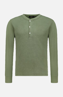 The RALPH LAUREN RRL Waffle Knit Long Sleeve Henley Shirt, shown in olive green, is made from waffle-knit cotton and features three vintage-inspired buttons on the placket, displayed against a plain white background.
