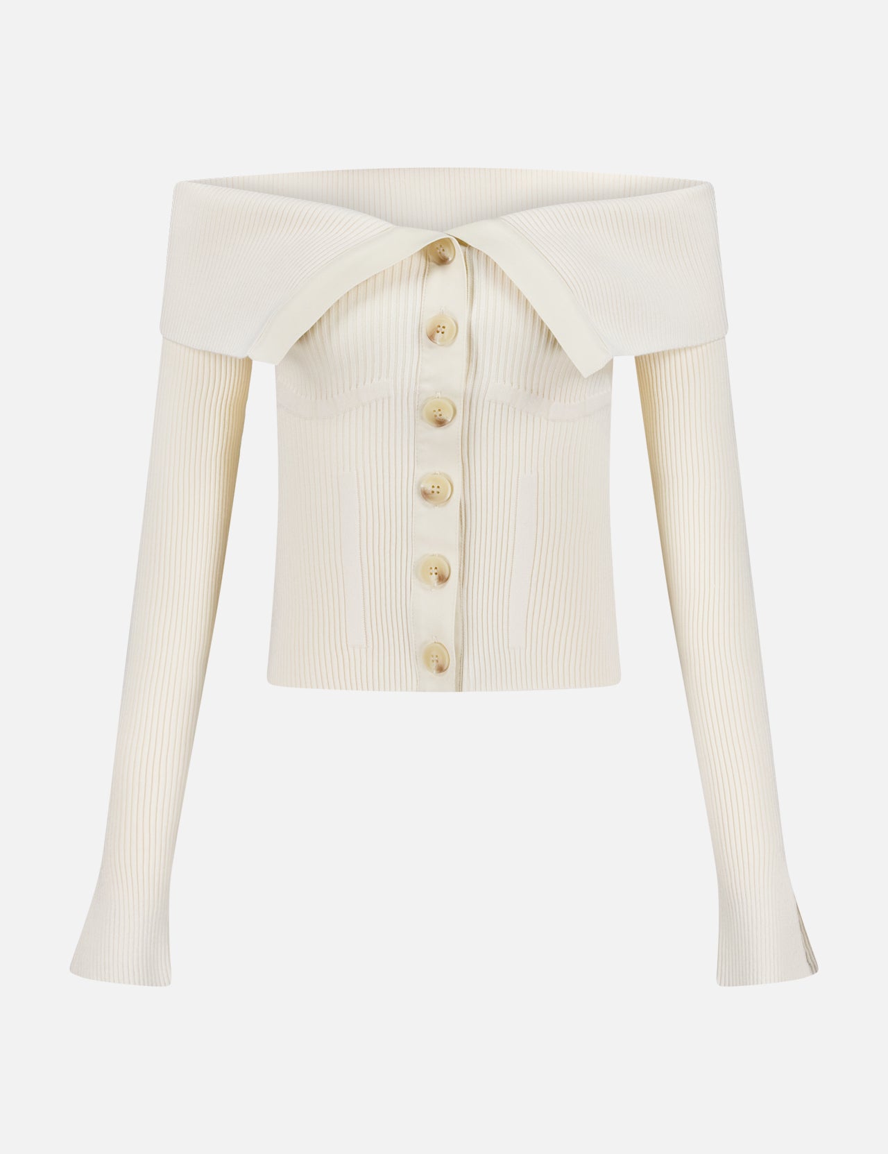 The Rebellion Bandeau Cardigan by ZIMMERMANN is an off-white, ribbed, off-the-shoulder sweater with a wide fold-over collar and front button closure. Its fitted silhouette and vertical ribbing evoke the look of an ivory cardigan.