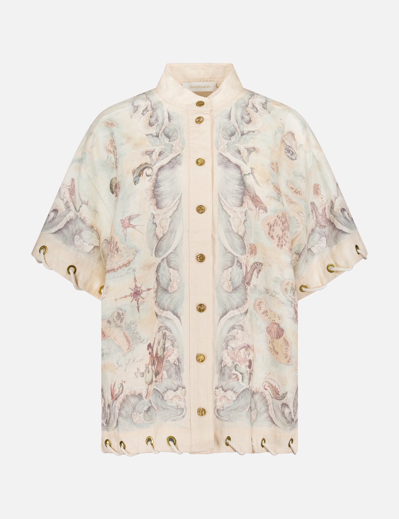 The ZIMMERMANN Rebellion Rope Shirt is a short-sleeved, cream linen shirt with a high collar, gold buttons, whimsical animal and nature prints, and rope detailing through metal eyelets on the sleeves and hem for a decorative finish.