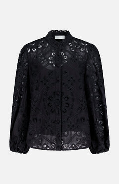 The Rhiannon Embroidered Blouse by ZIMMERMANN is a black cotton top with lace embroidery, scalloped collar, puffed sleeves, button-down front, and circular floral cutouts. Shown against a plain white background.