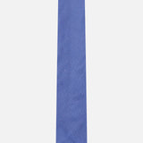 The Duvall Grenadine Unlined Tie by ROBERT TALBOTT features solid blue silk with a subtle textured pattern—an essential luxury tie for any refined wardrobe, shown on a plain white background.