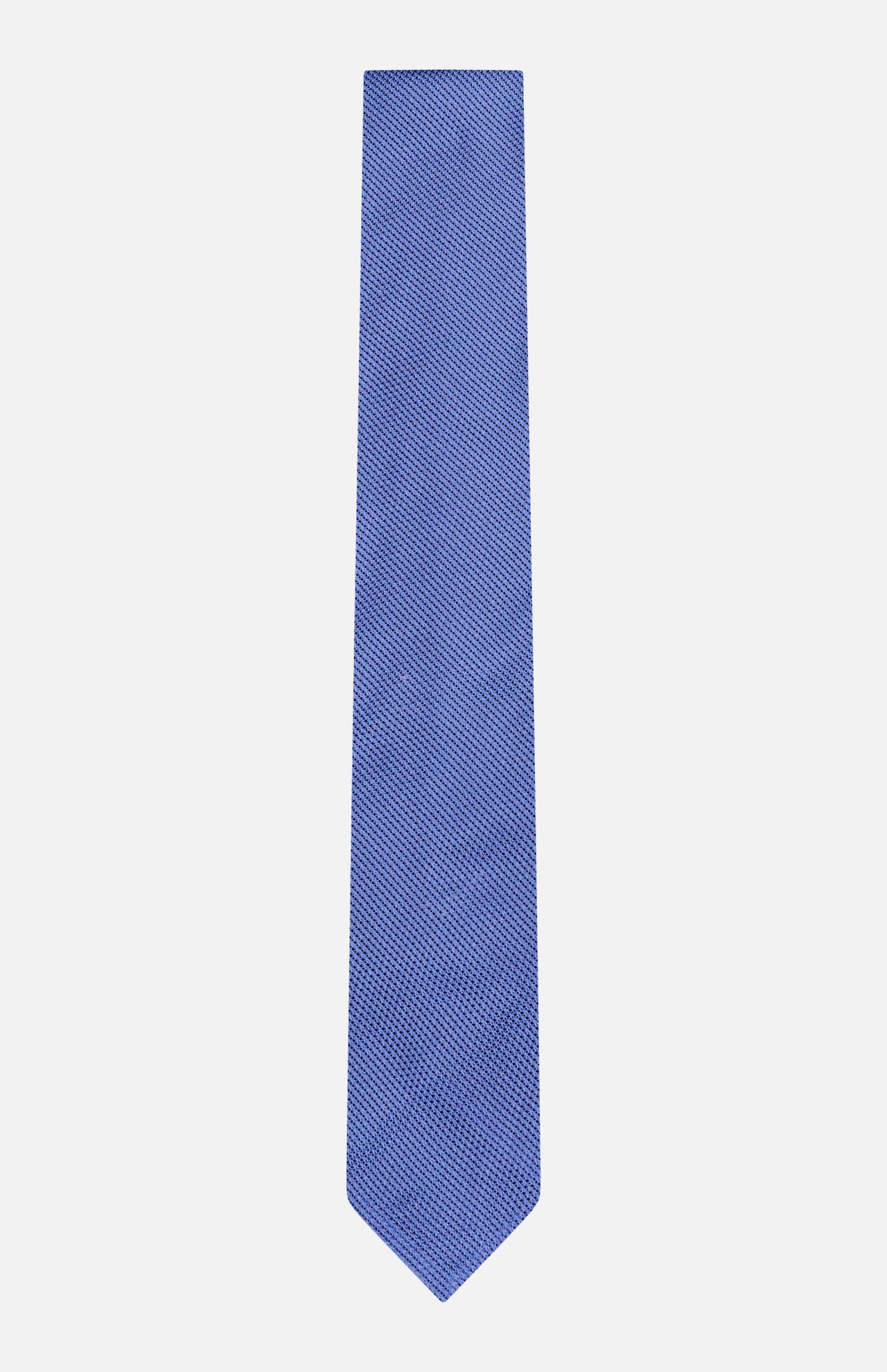 The Duvall Grenadine Unlined Tie by ROBERT TALBOTT features solid blue silk with a subtle textured pattern—an essential luxury tie for any refined wardrobe, shown on a plain white background.