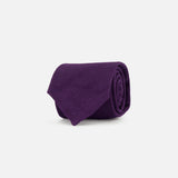 The Duvall Grenadine Unlined Tie by ROBERT TALBOTT is shown rolled up on a plain, light gray background.
