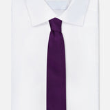 A crisp white dress shirt with a pointed collar is paired with the Duvall Grenadine Unlined Tie by ROBERT TALBOTT, shown against a plain light background.
