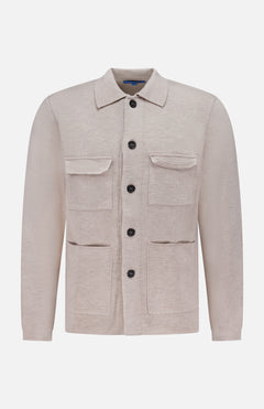 The ROBERT TALBOTT Landon Sweater Jacket is a light beige, long-sleeve hybrid sweater-jacket featuring a collar, black buttons, and four front pockets. Crafted in a tailored fit from premium Merino wool, it is displayed on a plain white background.