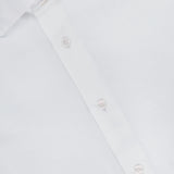 Close-up of a white ROBERT TALBOTT Reynolds Contemporary Cotton Linen Dress Shirt with a blue label inside the collar. This shirt features white buttons, a classic collar, and is ideal for business casual style.