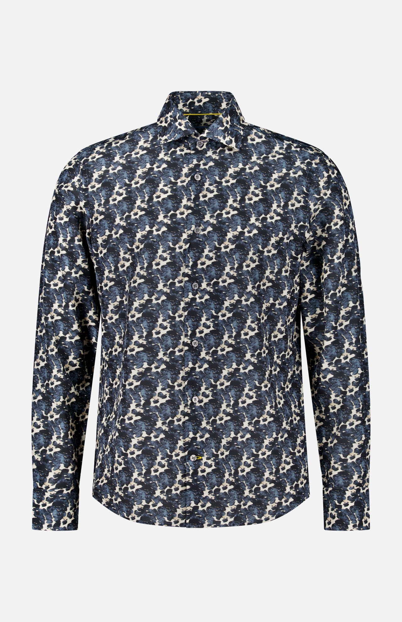 The Reynolds Printed Cow Hide Dress Shirt by ROBERT TALBOTT is a long-sleeve, button-up dark navy dress shirt featuring a blue, white, and black abstract floral pattern. It is crafted from a luxurious Italian silk cotton-blend fabric and is displayed against a plain white background.