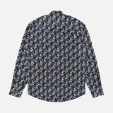 The Reynolds Printed Cow Hide Dress Shirt by ROBERT TALBOTT is a long-sleeve button-up crafted from an Italian silk cotton-blend, featuring an all-over navy blue, white, and beige floral pattern. It is shown from the back against a white background.