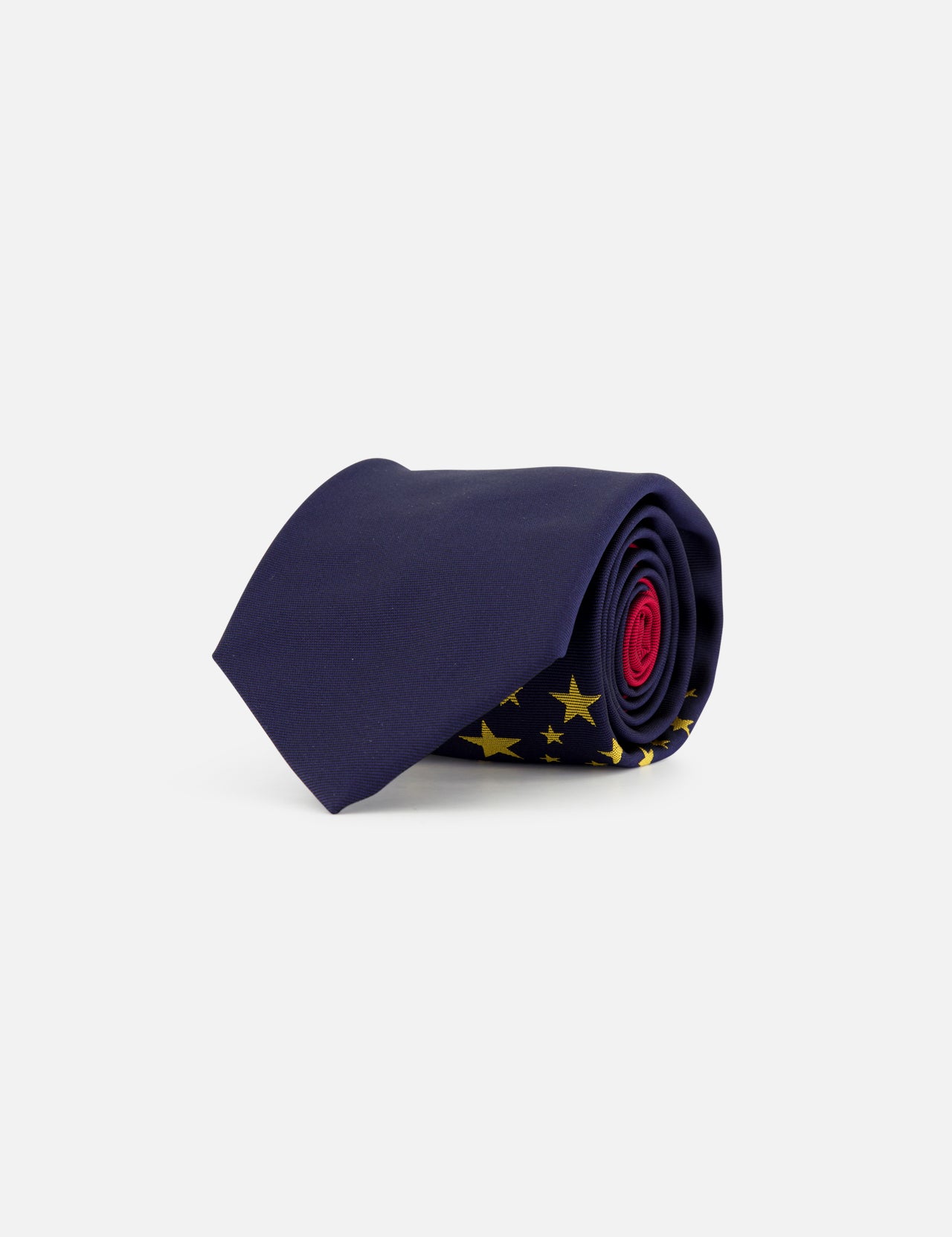 The ROBERT TALBOTT Robert Best Of Class Stars Two Tone Neck Tie, crafted in Italy, features navy silk with yellow star patterns and red accents on the inner layers, elegantly displayed against a plain white background.