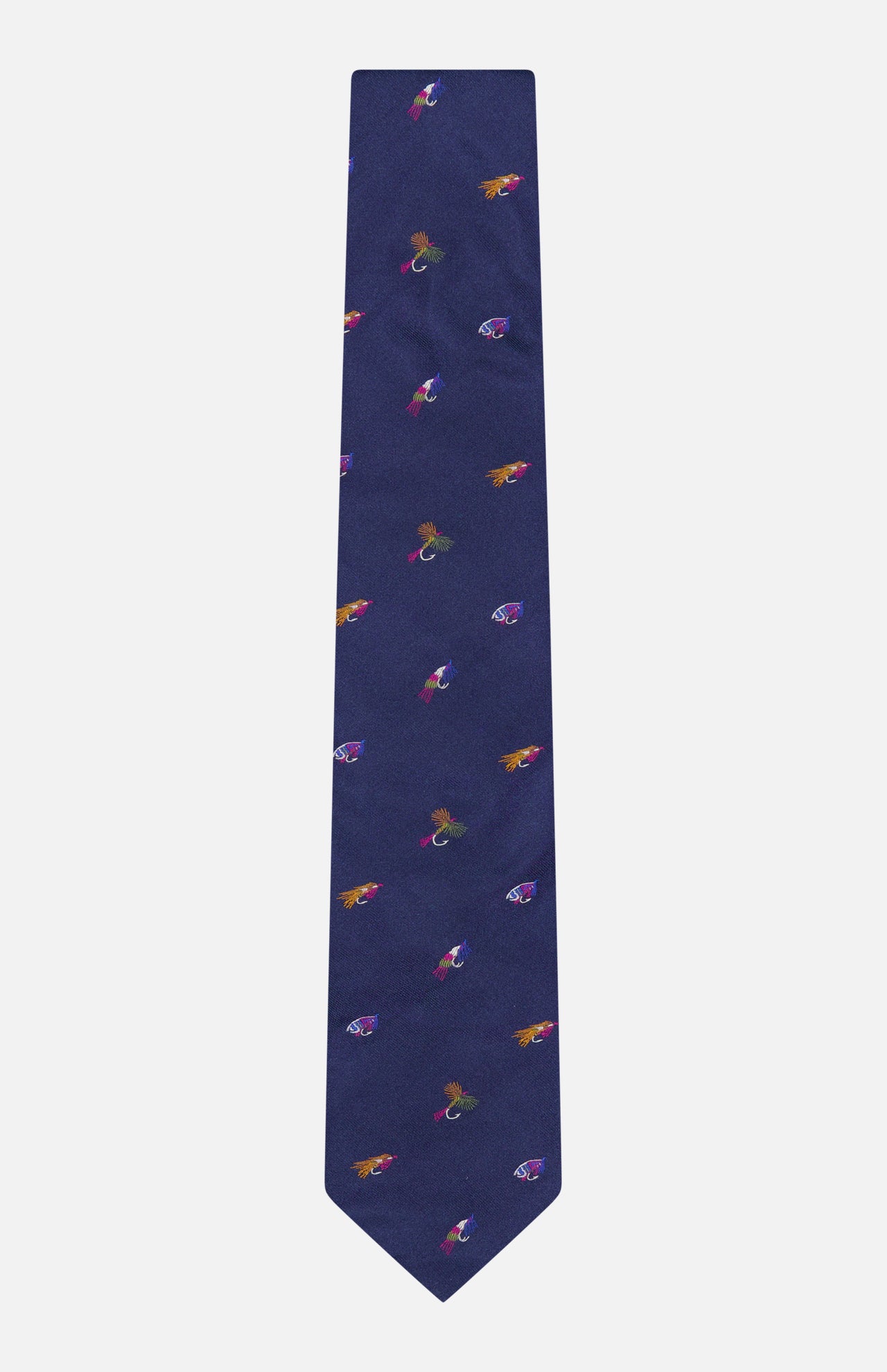 Introducing the ROBERT TALBOTT Robert Fishing Flies Tie—a navy silk men’s luxury necktie adorned with a repeating pattern of small, colorful embroidered fishing flies. This elegant design adds a playful yet sophisticated touch to any formal ensemble.