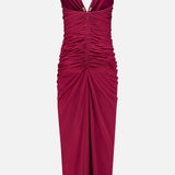 The Anya Ruched Maxi Dress by RONNY KOBO features a sleeveless deep magenta design with thin spaghetti straps, plunging V-neckline, ruched bodice and skirt, fitted silhouette, and front slit—an elegant choice for any occasion.