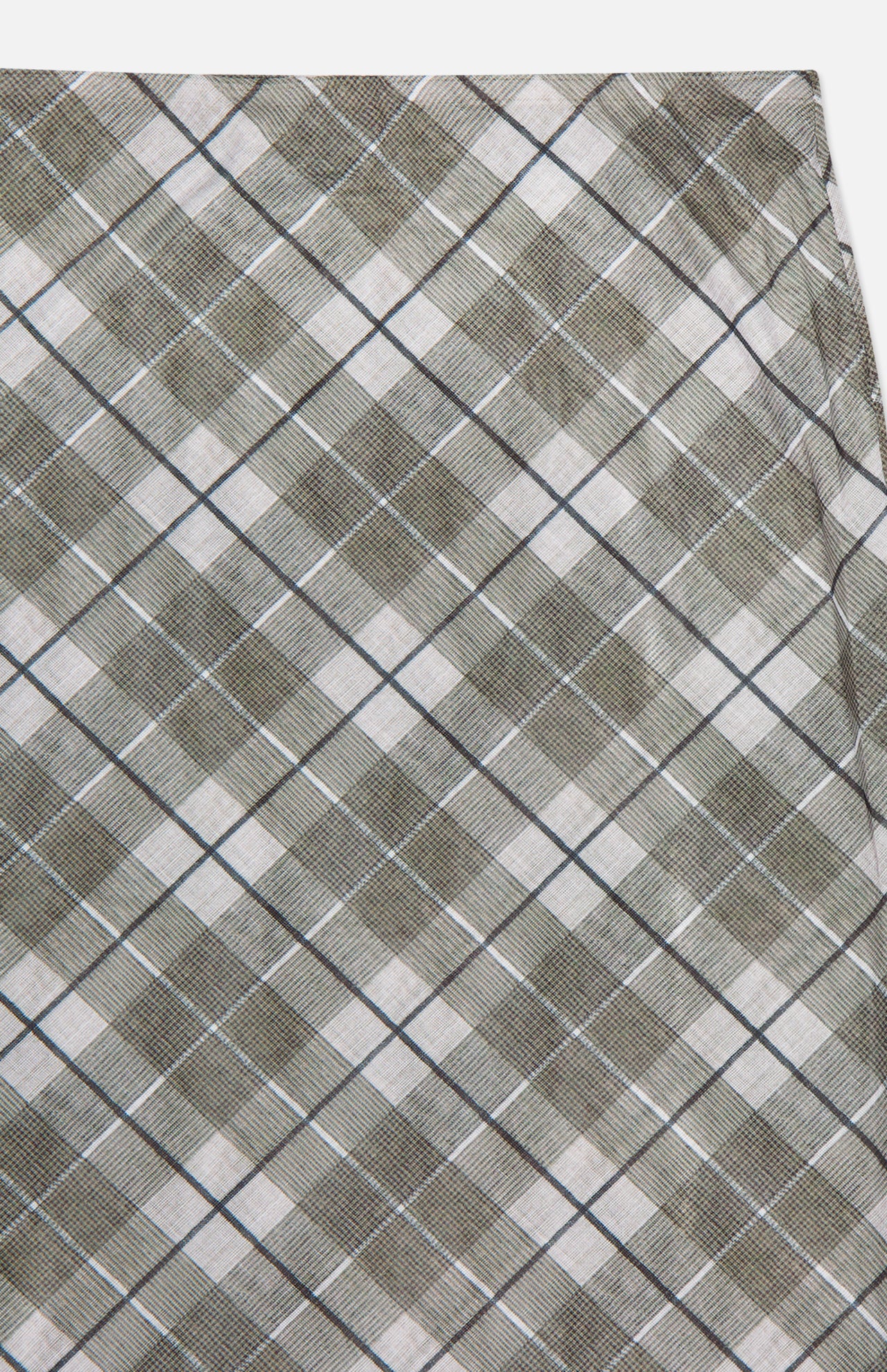 A close-up of the Azana Mesh Plaid Skirt by RONNY KOBO shows its gray, light blue, and white plaid pattern in a diagonal grid—ideal for stylish office wear. The fabric is slightly folded at the upper right.