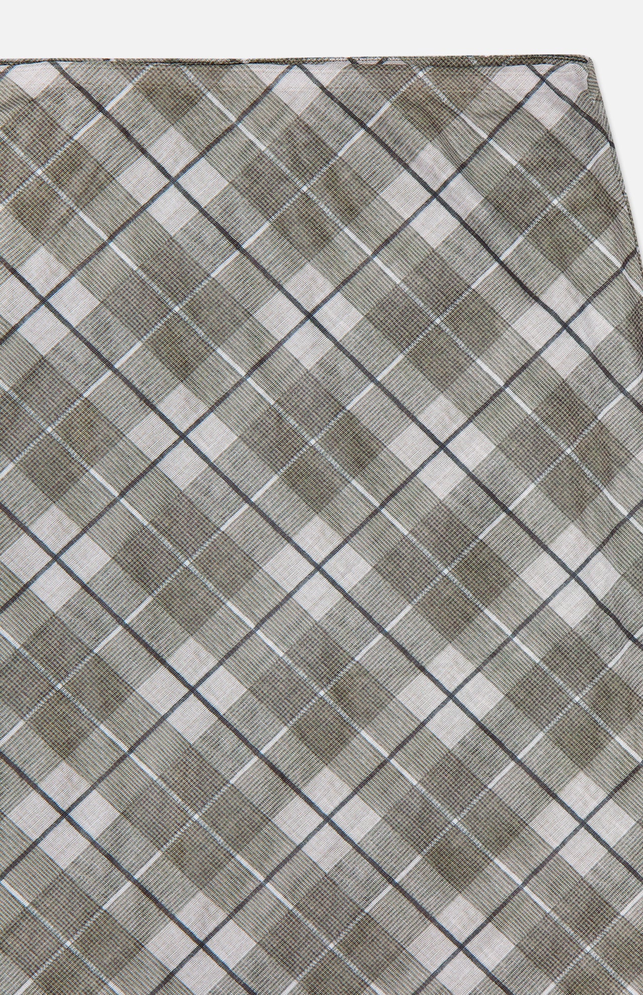 Close-up of the Azana Mesh Plaid Skirt by RONNY KOBO, showing gray, brown, and white plaid with thin blue lines in a diagonal pattern. Slight folds at the top right add texture—ideal for a chic office look.