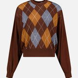 The Bradley Argyle Sweater by RONNY KOBO is a brown wool-cashmere piece showcasing an argyle pattern in brown, orange, and gray on the front, displayed against a plain white background.