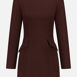 The Brette Pocket Mini Dress by RONNY KOBO is a chocolate brown, long-sleeve mini dress featuring a fitted waist, round neckline, and decorative hip flaps, shown against a plain white background.
