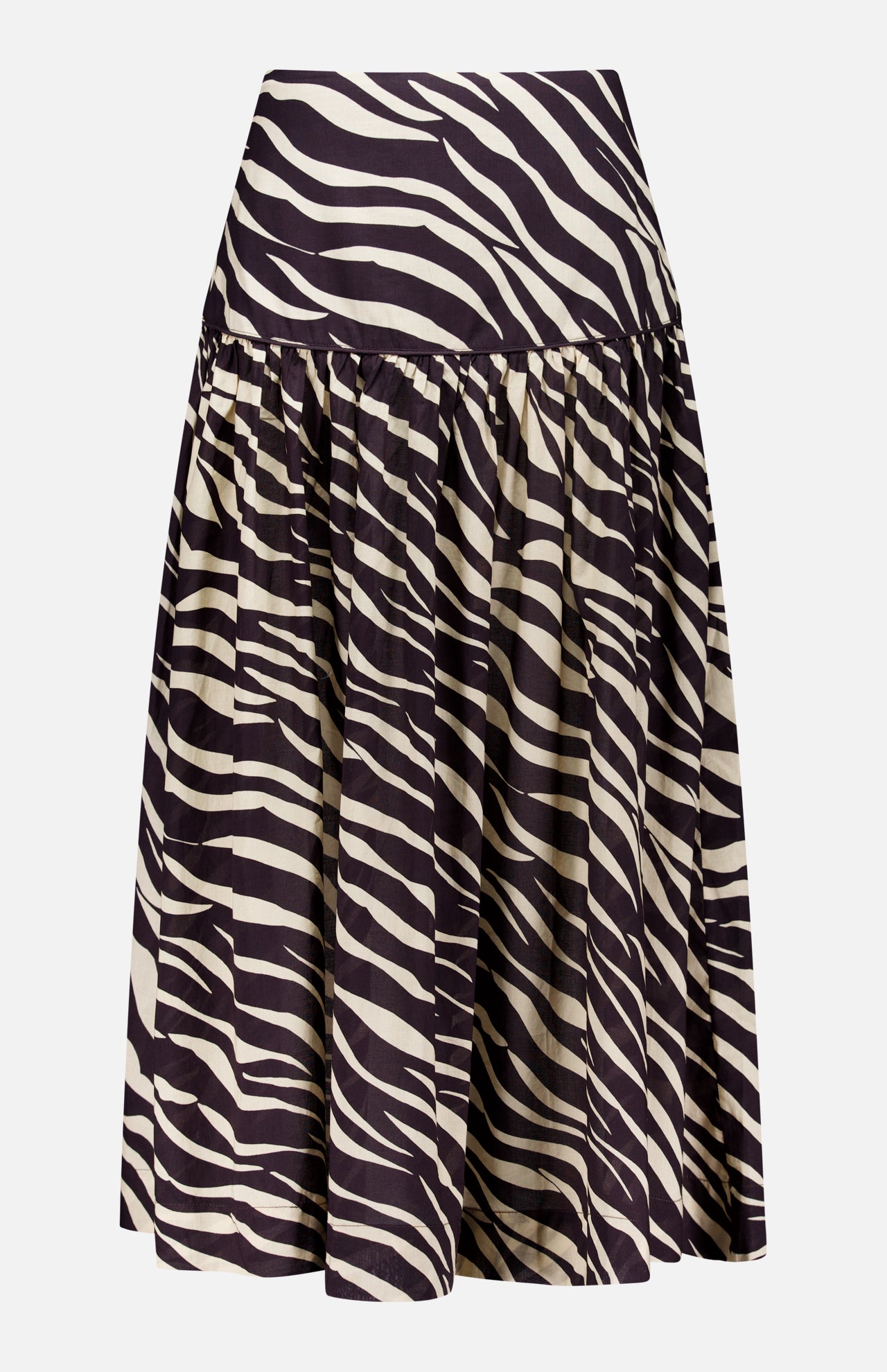 The Feyre Animal Print Skirt by RONNY KOBO is a knee-length, flared design with a high waist and bold black-and-white zebra print. It features gathered fabric at the waistband for a full, flowing silhouette and has a subtle sheen.