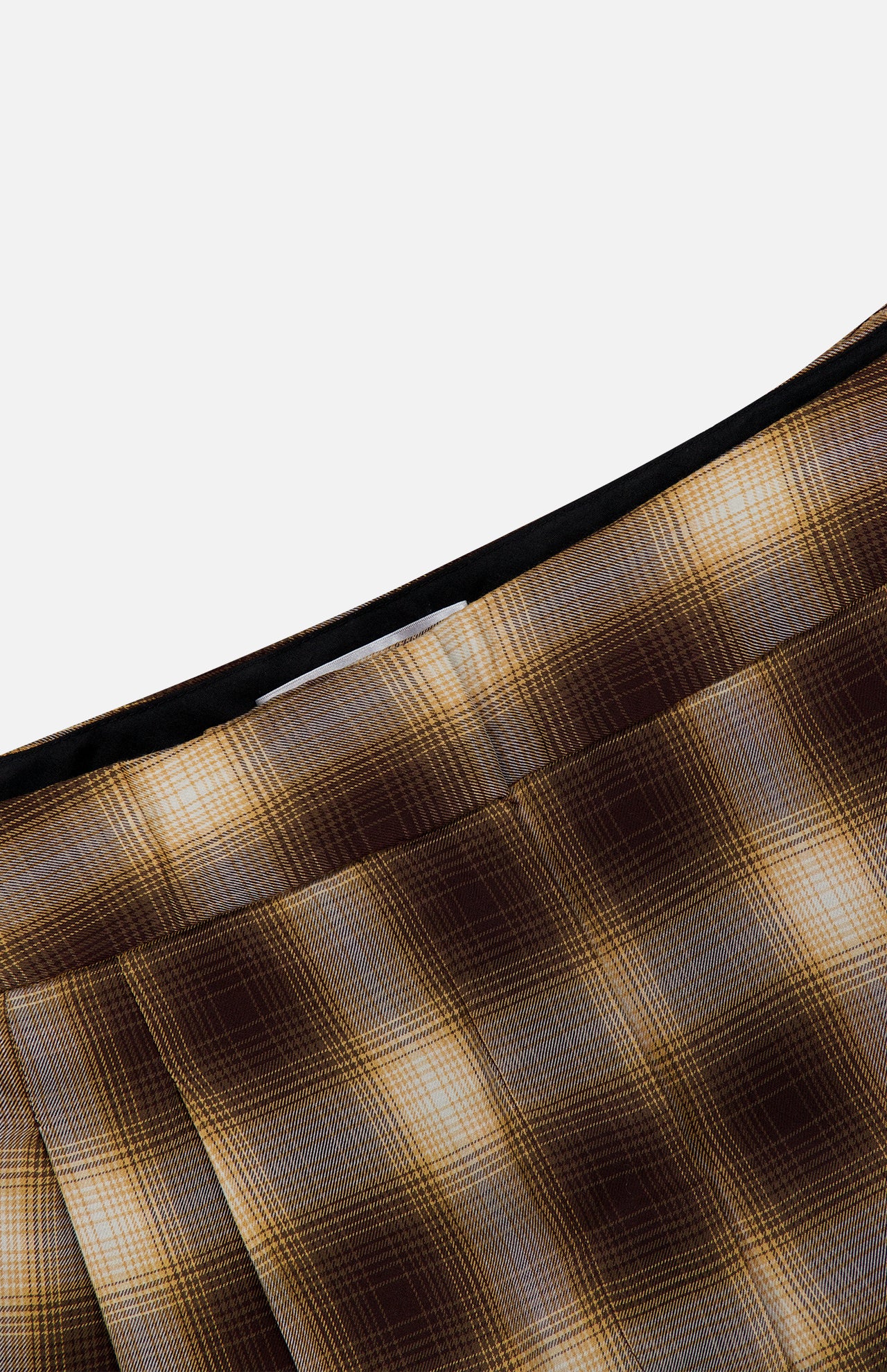 Close-up of the Hayes Plaid Straight Leg Pant by RONNY KOBO, showcasing its brown and yellow plaid pleated fabric, high-rise waist, and straight-leg silhouette against a plain light background.