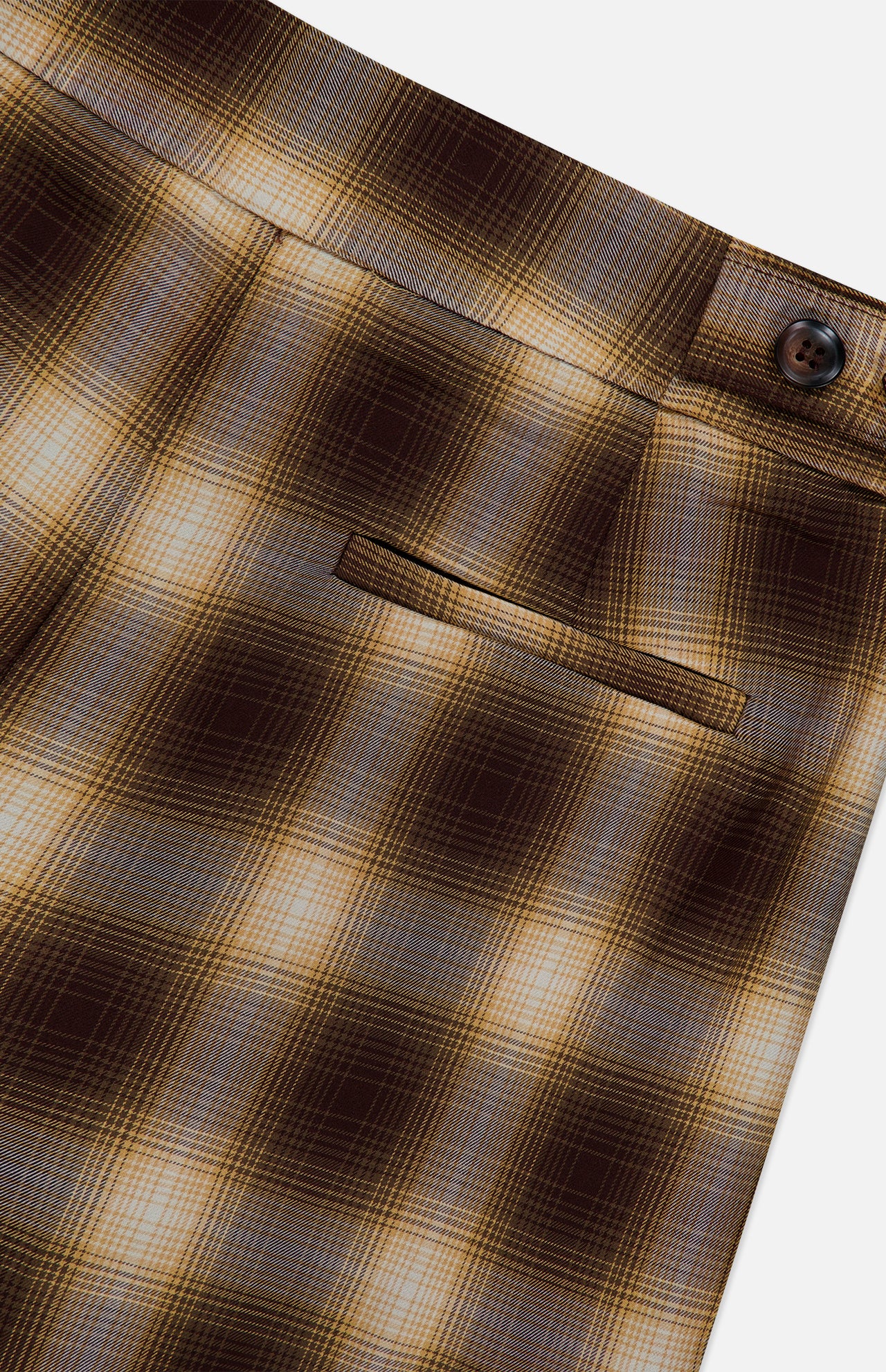 Close-up of the Hayes Plaid Straight Leg Pant by RONNY KOBO, showcasing its straight-leg silhouette with a high-rise waist, detailed back pocket, and buttoned waistband. The soft fabric features a subtle faded plaid pattern and refined tailoring for a classic finish.