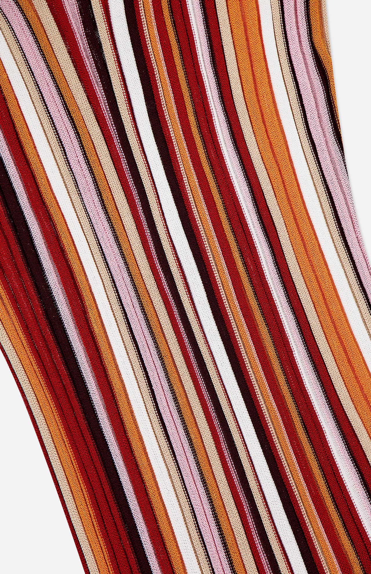 A close-up of the RONNY KOBO Kerry Knit Midi Dress, showcasing ribbed knit fabric with wavy vertical stripes in sunset hues—red, orange, brown, pink, and white—set against a plain white background.