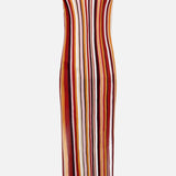 The Kerry Knit Midi Dress by RONNY KOBO is a sleeveless, form-fitting knit dress with a round neckline and ankle-length hem. It features vertical sunset-hued stripes—red, orange, yellow, white, and brown—on a white background.