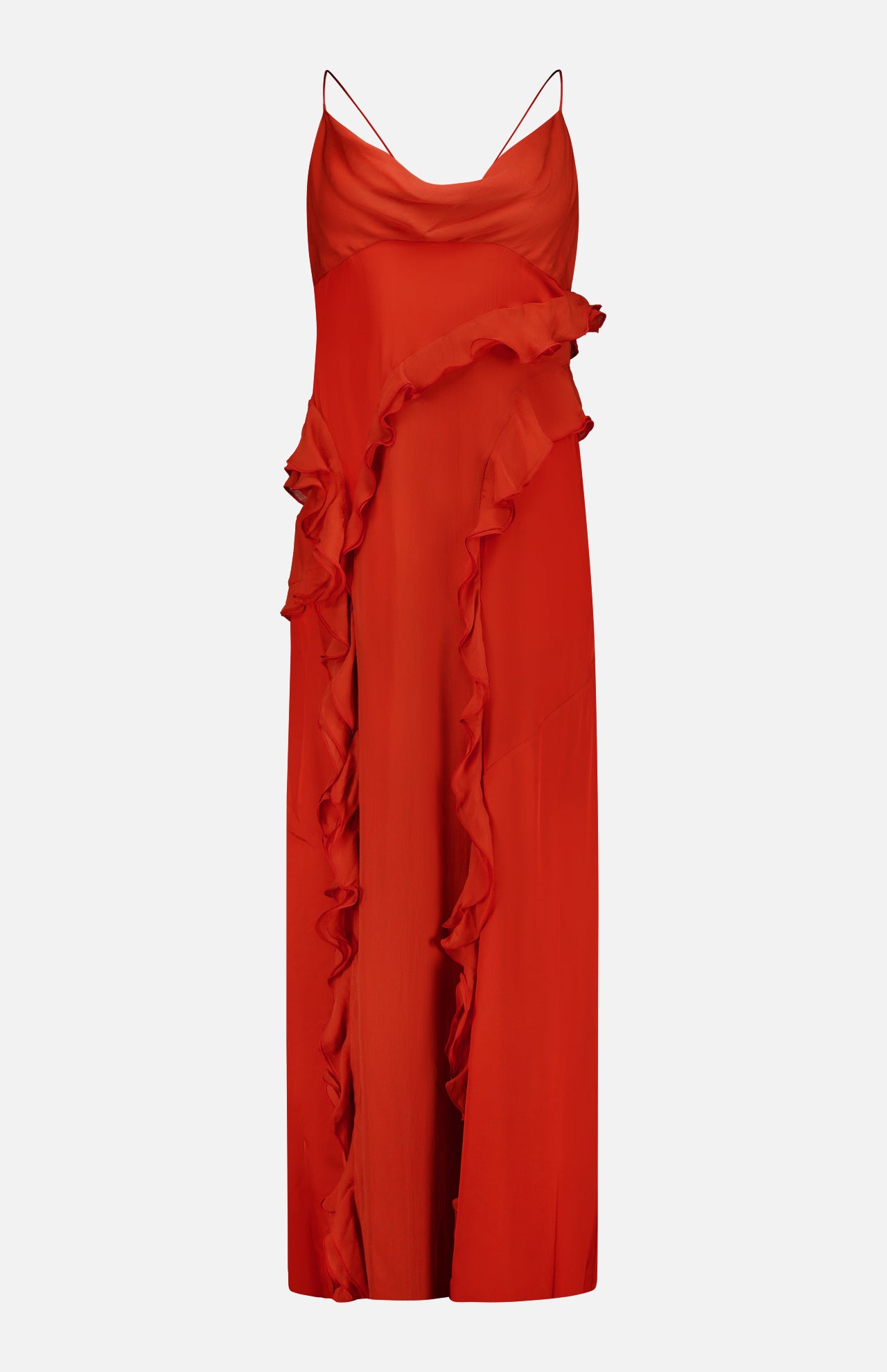 The Milena Draping Maxi Dress by RONNY KOBO is a sleeveless, vibrant red dress with thin spaghetti straps, showcasing fluid draping and a ruffled detail that cascades diagonally from the waist to the hem. It features a subtle thigh-high slit for an added touch of elegance.