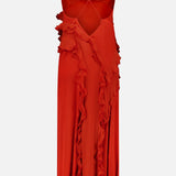 The Milena Draping Maxi Dress by RONNY KOBO is a sleeveless, bright red dress featuring thin spaghetti straps, a deep neckline, and cascading ruffle details along the front and sides. Crafted from a lightweight, silky fabric that drapes fluidly, it also boasts a fitted upper bodice for an elegant silhouette.
