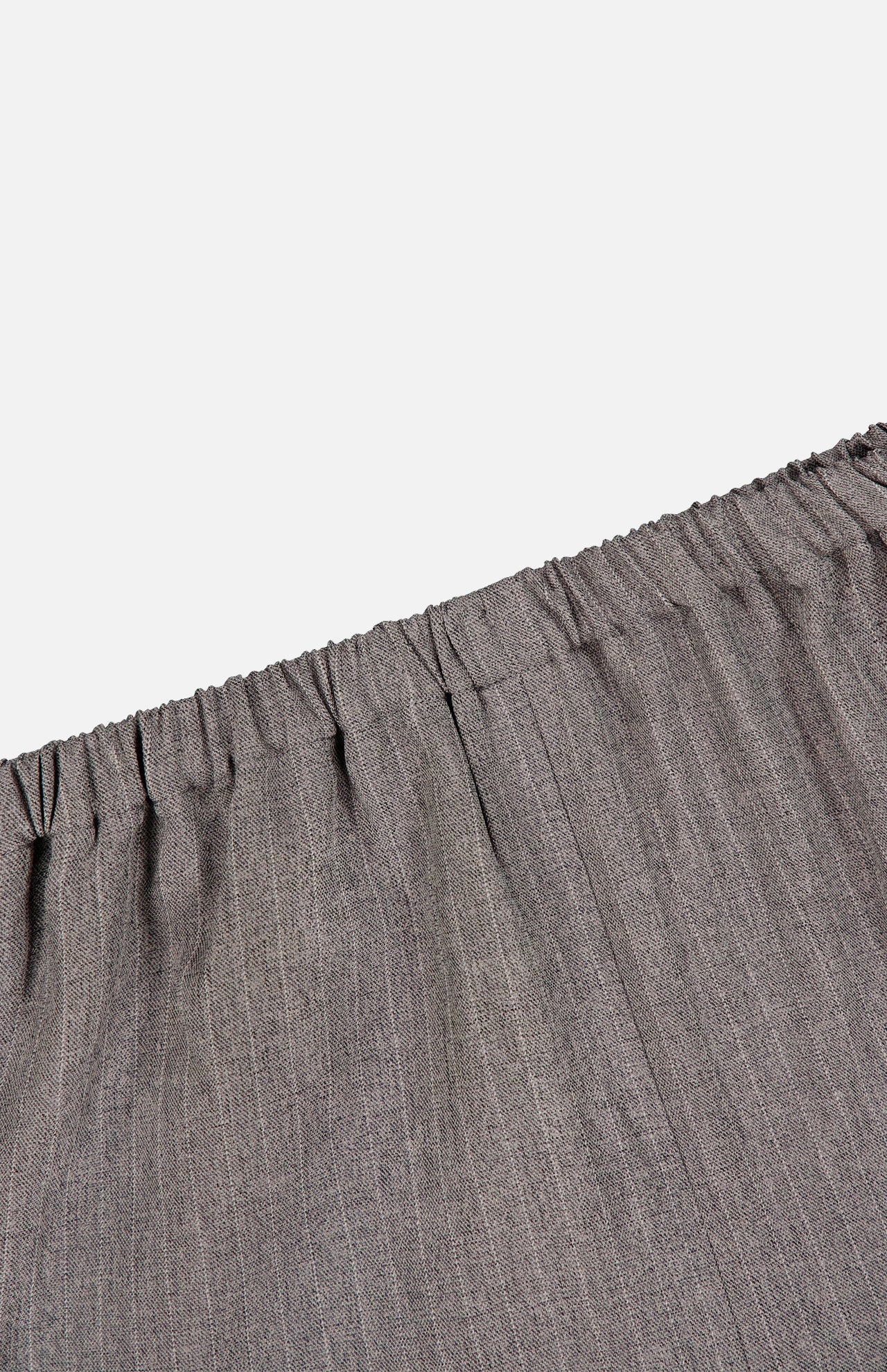 Close-up of the RONNY KOBO Moni Stripe Pull-on Pant in gray, featuring a gathered elasticized waistline detail, set against a plain white background.