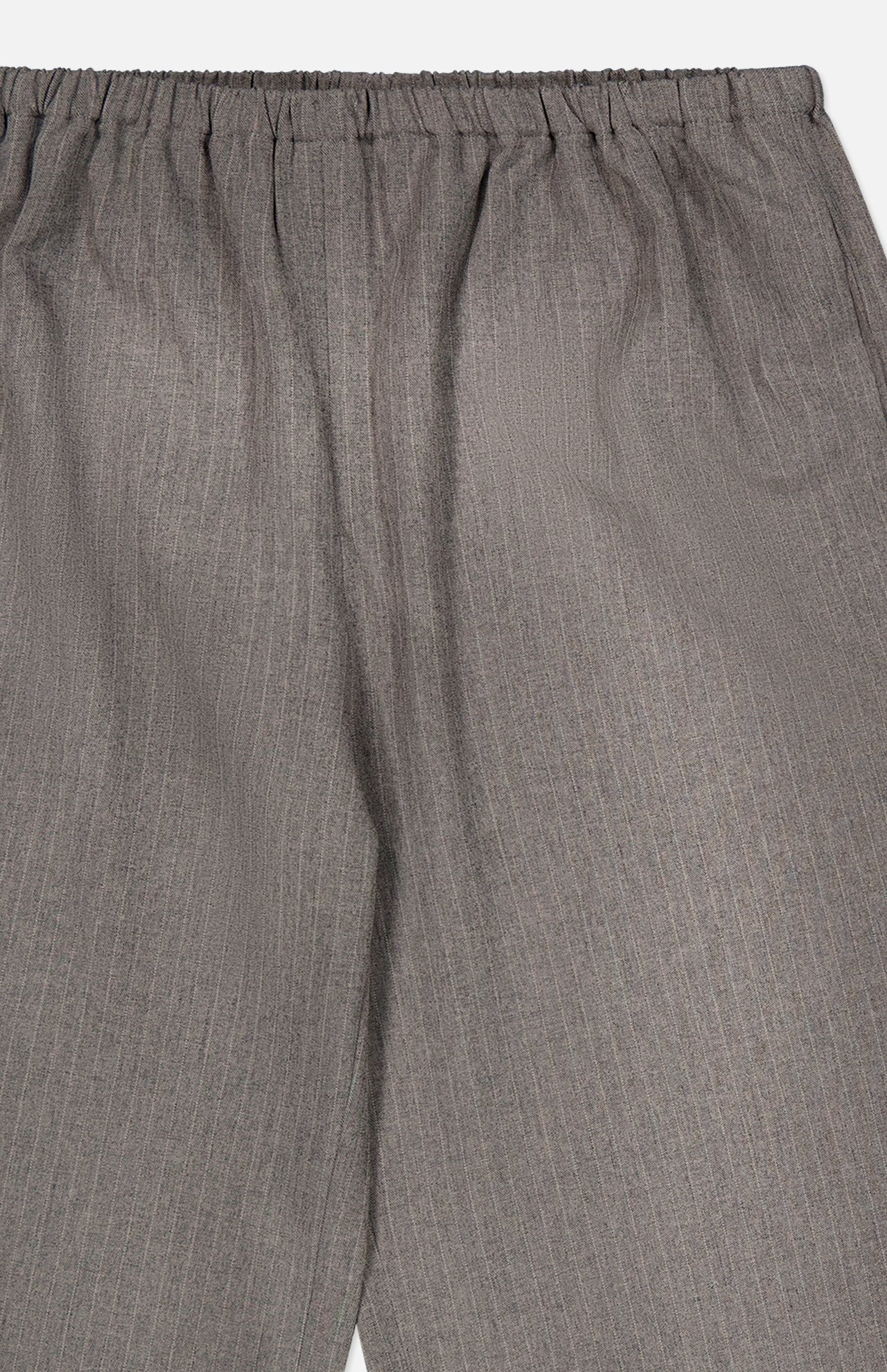 The Moni Stripe Pull-on Pant by RONNY KOBO features an elasticized waistline and subtle vertical pinstripes in a gray hue, shown from waist to knee. The lightweight fabric has a soft texture for comfortable wear.
