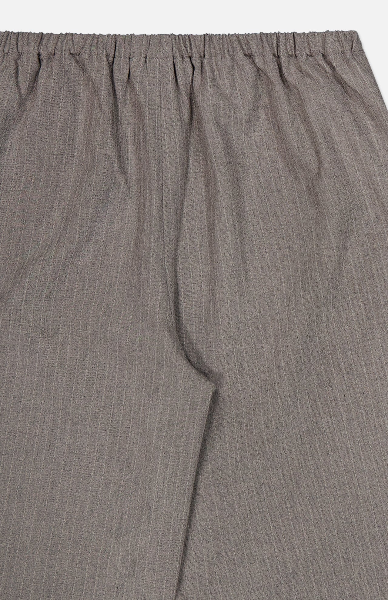 Close-up of the RONNY KOBO Moni Stripe Pull-on Pant in grey, showcasing a subtle pinstripe pattern, elasticized waistline, and gathered fabric at the top.