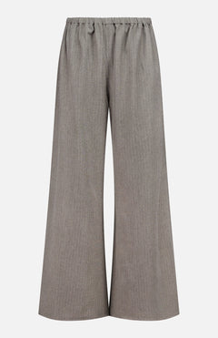 The Moni Stripe Pull-on Pant by RONNY KOBO features a wide-leg silhouette and an elasticized waistline, crafted from a lightweight, textured fabric in grey. These loose-fitting pants fall straight to the floor and are shown against a plain white background.