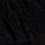 Close-up of the Rosette Lace Detail Bodysuit by RONNY KOBO, featuring sheer black floral lace and gathered top—ideal for a chic going-out look.