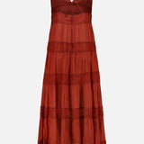 The Rune Lace Panel Maxi Dress by RONNY KOBO features a sleeveless rust design with spaghetti straps, deep V-neck, layered lace panels on the skirt, and a slightly sheer upper bodice for a bohemian, elegant look.