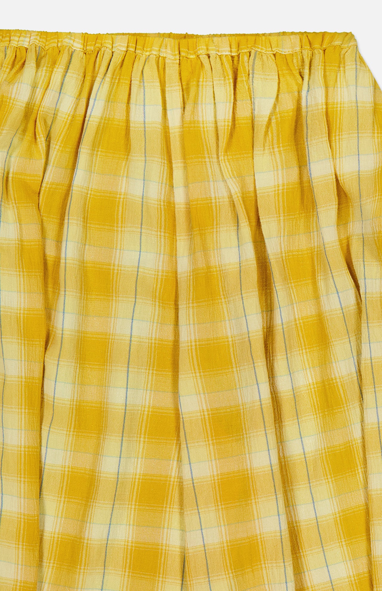 The Ryker Plaid Balloon Pant by RONNY KOBO features yellow and white plaid fabric with gathered, pleated folds at the top, evoking a relaxed pull-on silhouette.