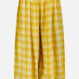 The Ryker Plaid Balloon Pant by RONNY KOBO features a wide-leg silhouette in yellow and white plaid, complete with an elastic waistband and ballooned hem for a trendy, relaxed pull-on style, displayed against a plain white background.