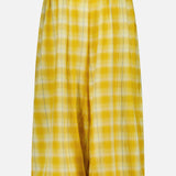 Introducing the Ryker Plaid Balloon Pant by RONNY KOBO—these yellow and white plaid wide-leg pants feature an elastic waistband, gathered ankles, and a relaxed pull-on fit. Shown against a plain white background, they’re perfect for anyone seeking trendy women’s pants with playful comfort and effortless style.