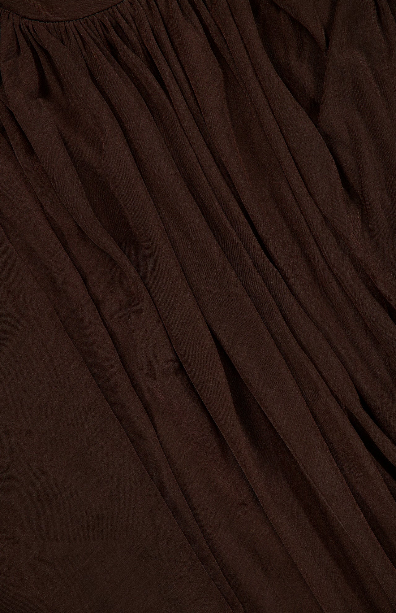 Close-up of the RONNY KOBO Sav Draped Sleeveless Top in chocolate brown, featuring gathered pleats for a textured, flowing look.