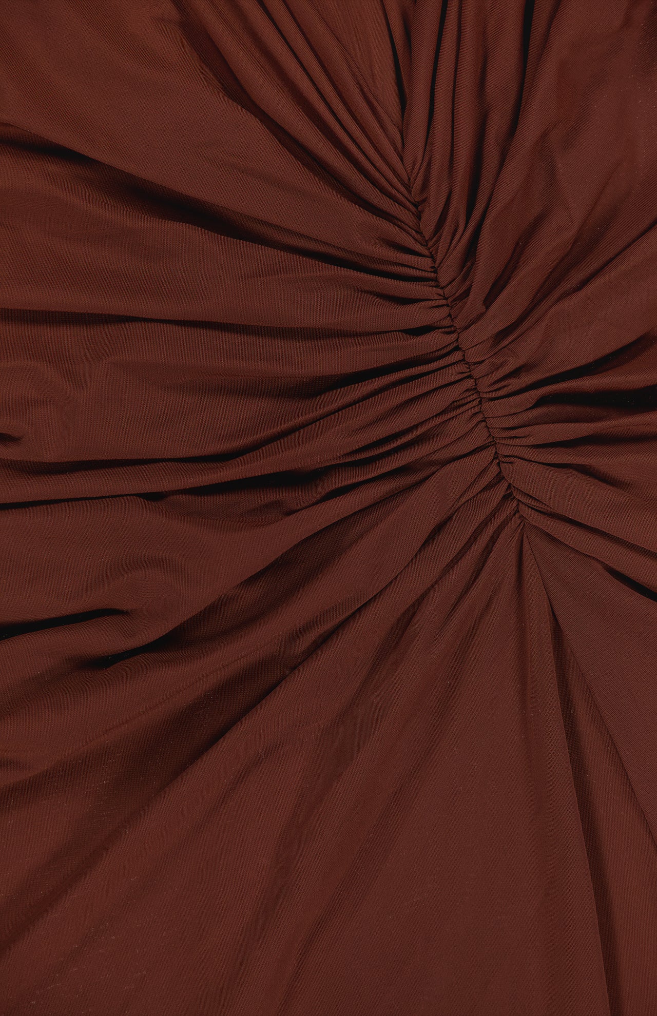 The Scorpio Ruched Waist Dress by RONNY KOBO features chocolate brown fabric gathered along a central seam to create flattering, radiating folds and a chic ruched texture.