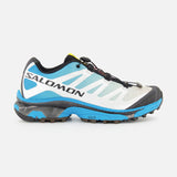 The SALOMON XT-4 OG Sneaker, shown from the side on a white background, is a trail running shoe in blue, white, and black featuring an Agile Chassis Skeleton and quick-lace system for enhanced stability and agility.
