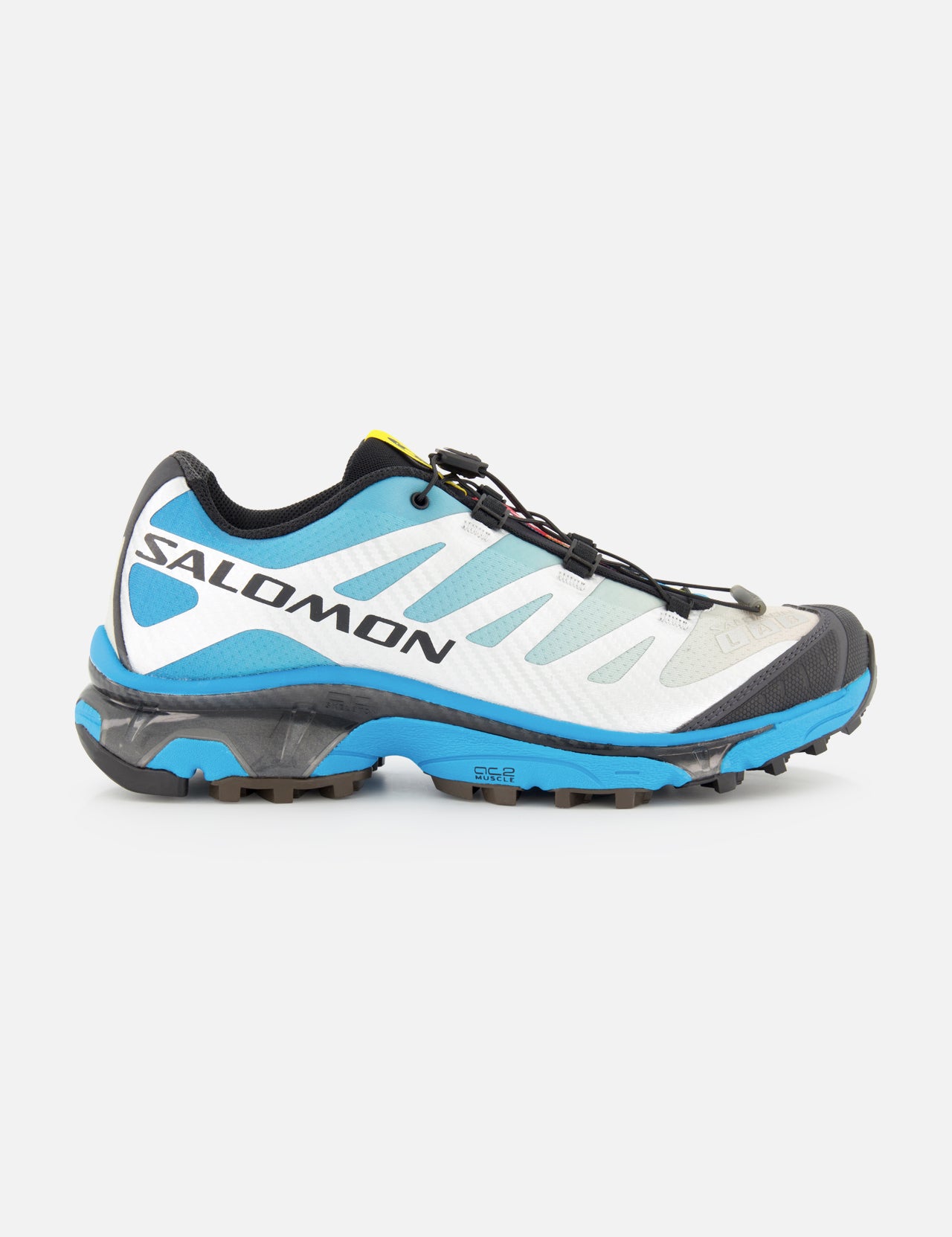 The SALOMON XT-4 OG Sneaker, shown from the side on a white background, is a trail running shoe in blue, white, and black featuring an Agile Chassis Skeleton and quick-lace system for enhanced stability and agility.