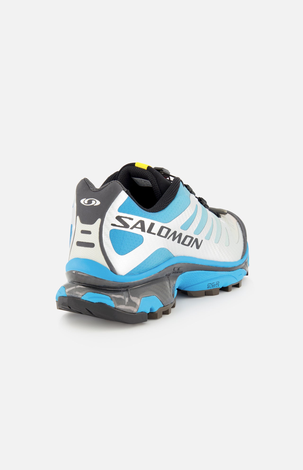 The SALOMON XT-4 OG Sneaker in blue, white, and black—showcasing the brand’s innovative Agile Chassis Skeleton—is displayed from the back against a plain white background, emphasizing its performance-oriented trail running design.