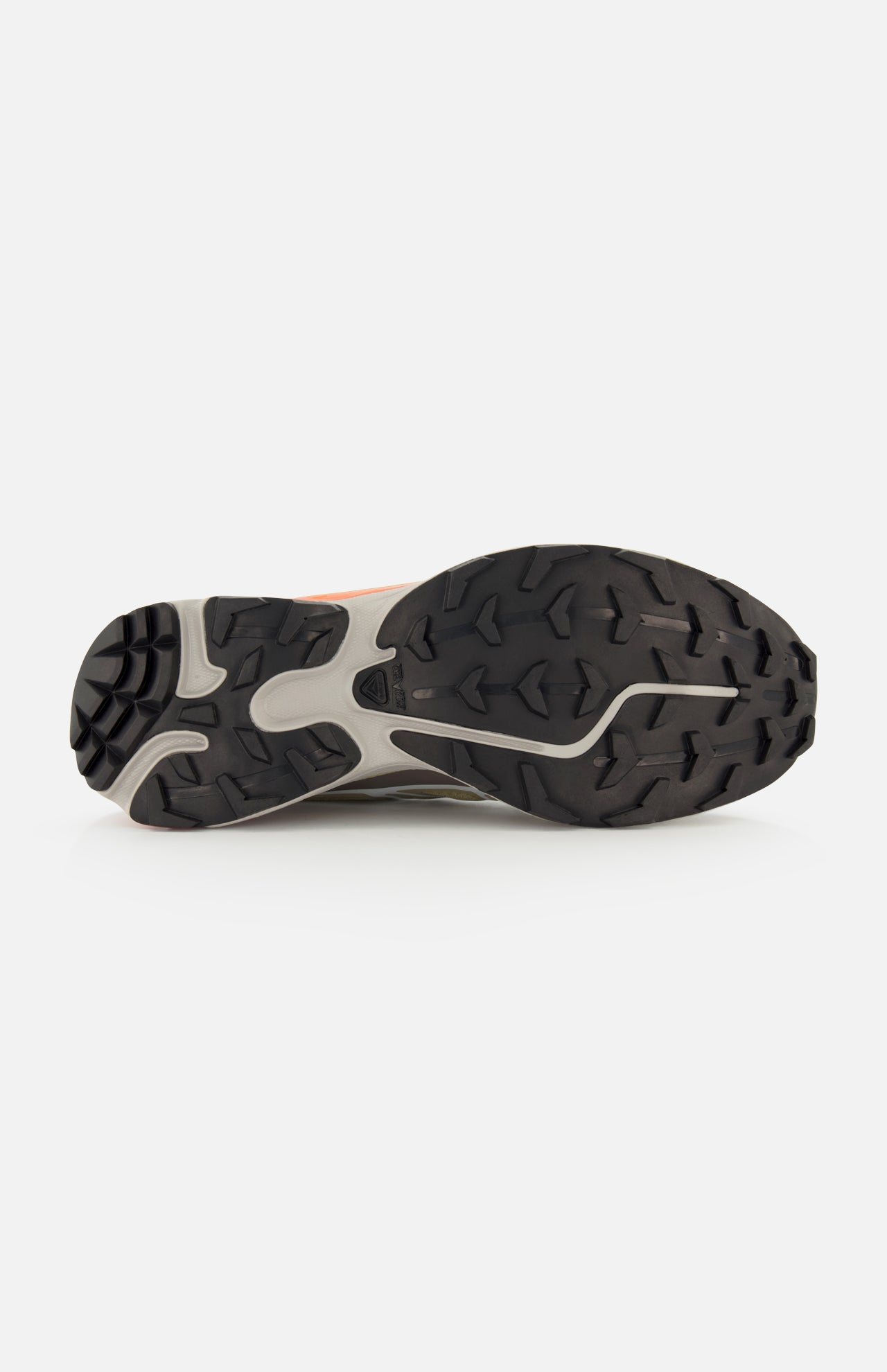Black rubber lugged outsole of a Salomon XT-6 Sneaker featuring a light gray and orange midsole for added durability.