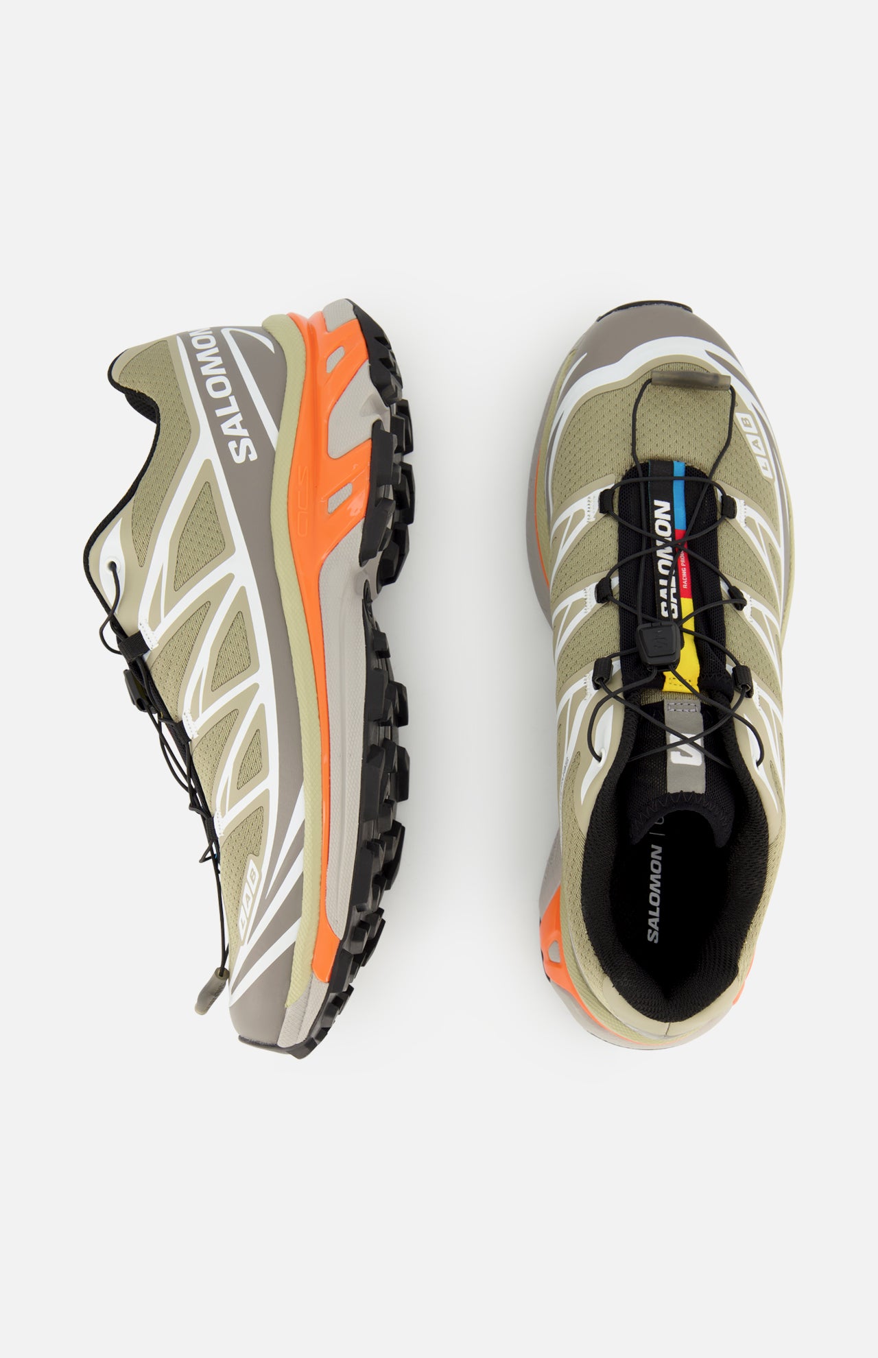 Top-down view of olive green Salomon XT-6 sneakers with orange midsole accents, cushioning, and a quick-lace system.