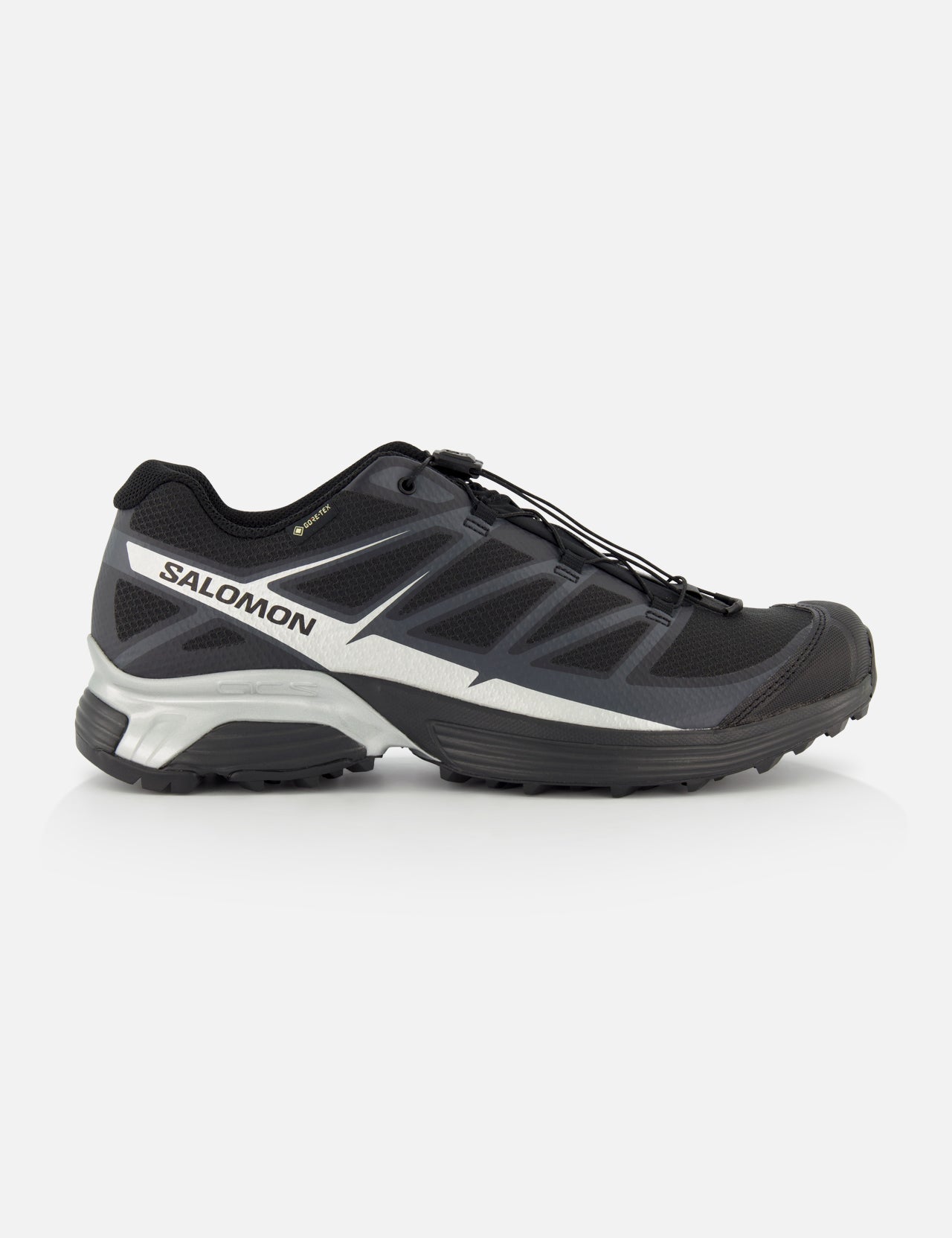 The SALOMON XT-Pathway GTX Sneaker in black and gray features a quick lace system, low-cut design, Gore-Tex waterproofing, and rugged sole, displayed in side profile against a white background.