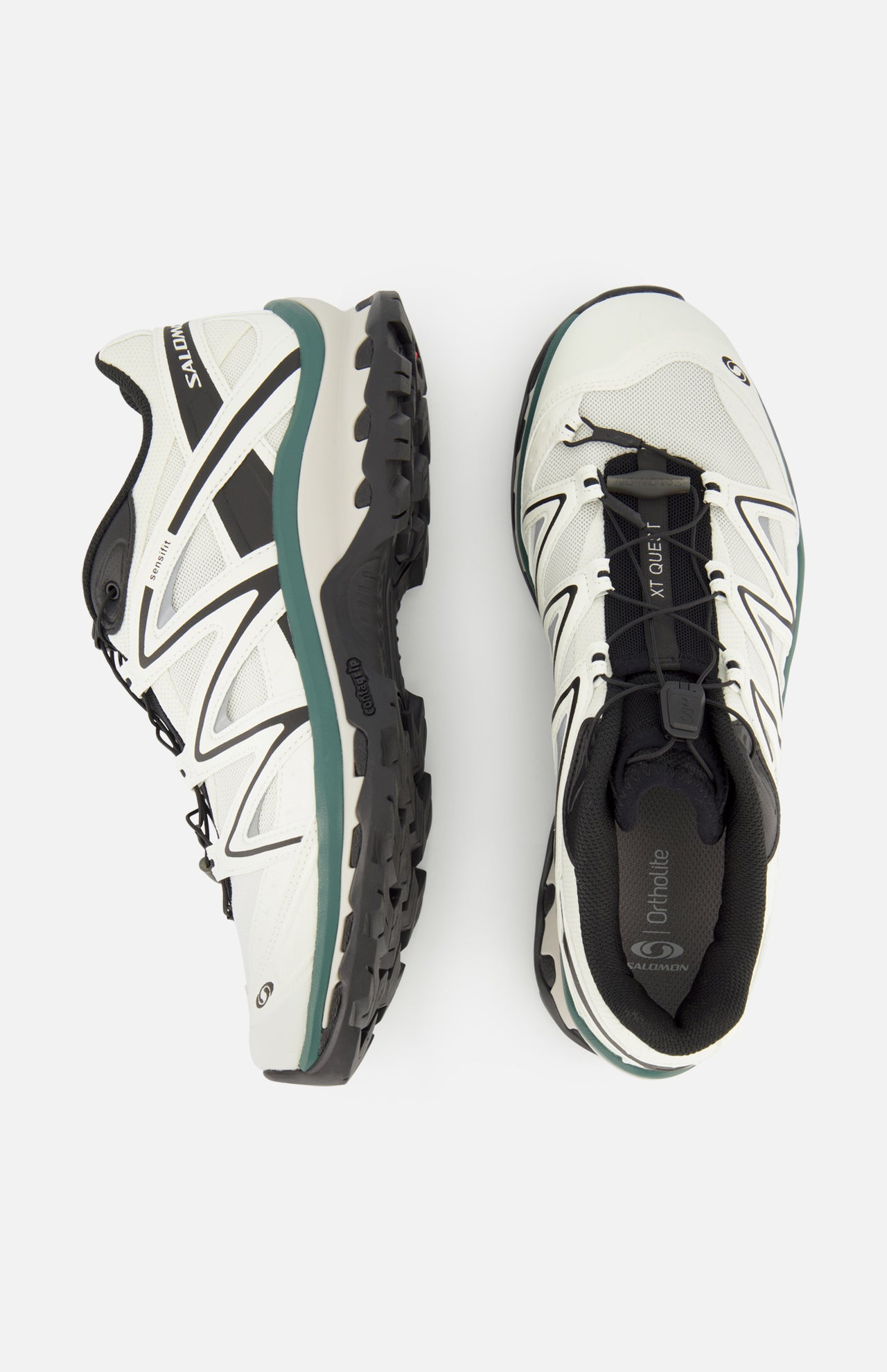 A pair of SALOMON XT-Quest Sneakers in a white and black colorway, one shown in a side profile and the other from an overhead view against a white background. Engineered for stability and grip, these hybrid trail running shoes deliver versatile performance suitable for both urban environments and outdoor adventures.